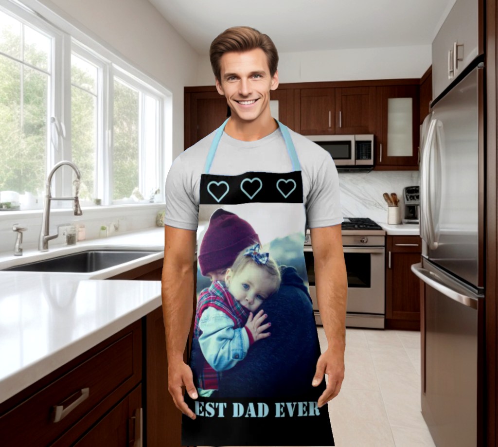man in a kitchen wearing a cool personalized photo apron and custom text best dad ever.
